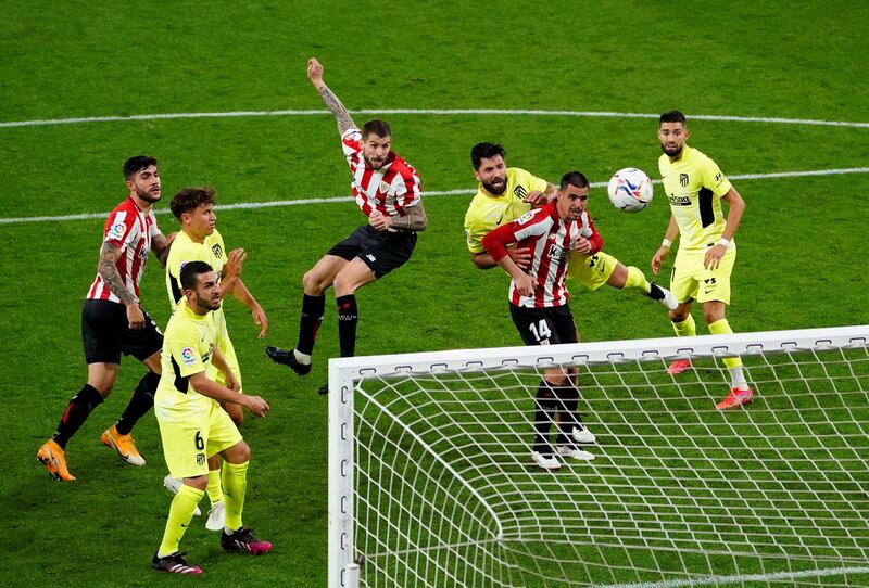 Athletic Bilbao's Inigo Martinez heads home his team's second goal in their 2-1 La Liga win over Atletico Madrid at the Estadio de San Mames on Sunday, April 25. Reuters