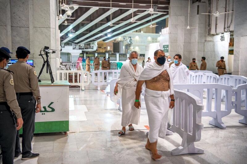 The first group of Muslims, allowed in the mosque compound by appointment, arrive at the Grand Mosque to perform Umrah. Courtesy General Presidency for the Affairs of the Grand Mosque and the Prophet's Mosque