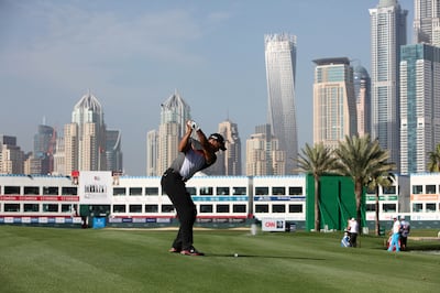 DUBAI , UNITED ARAB EMIRATES Ð Jan 30 , 2014 :  Tiger Woods playing during the 1st round of Omega Dubai Desert Classic golf tournament at Emirates Golf Club in Dubai. ( Pawan Singh / The National ) For Sports. Story by John McAuley