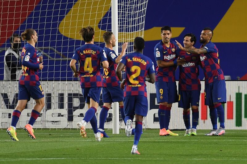 Lionel Messi celebrates with his team after scoring Barcelona's second goal. Getty Images