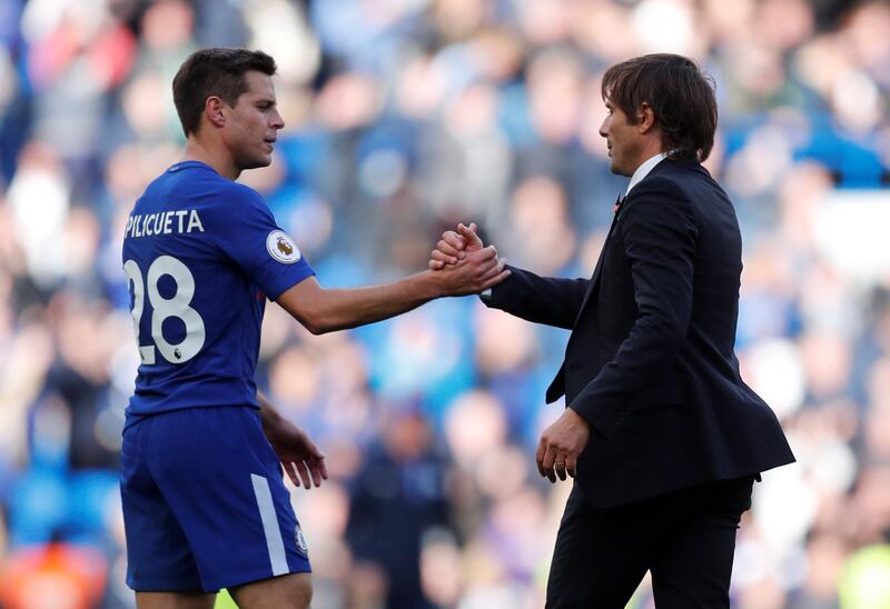 Soccer Football - Premier League - Chelsea vs Watford - Stamford Bridge, London, Britain - October 21, 2017   Chelsea manager Antonio Conte shakes hands with Cesar Azpilicueta after the match    REUTERS/Eddie Keogh    EDITORIAL USE ONLY. No use with unauthorized audio, video, data, fixture lists, club/league logos or "live" services. Online in-match use limited to 75 images, no video emulation. No use in betting, games or single club/league/player publications. Please contact your account representative for further details.