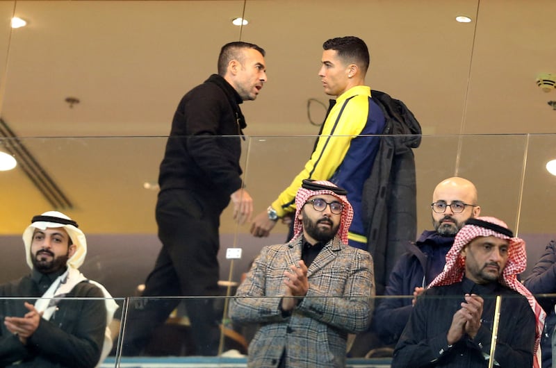 Cristiano Ronaldo in the stands during the Saudi Pro League match between Al Nassr and Al Ta'ee in Riyadh on Friday. Reuters