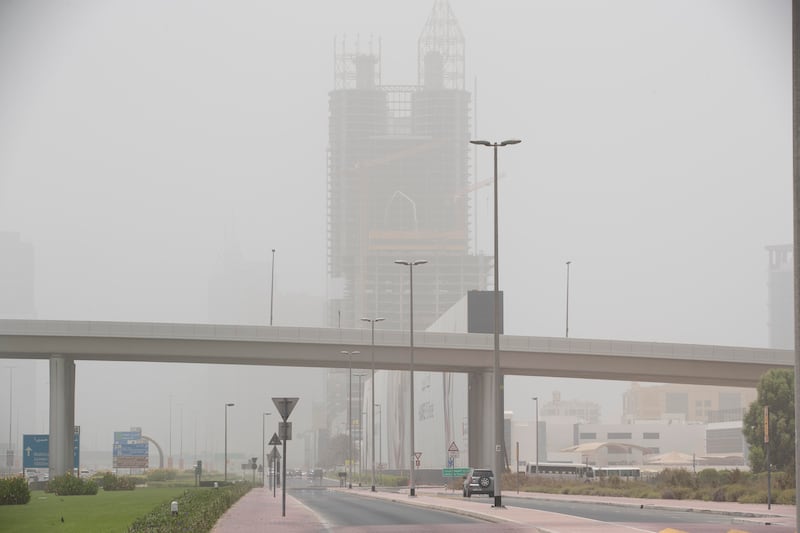 Hazy conditions as a sand storm hits Dubai. Antonie Robertson / The National
