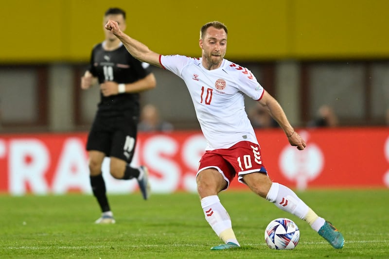 Denmark's Christian Eriksen, right, passes the ball during the Nations League match against Austria. AP Photo
