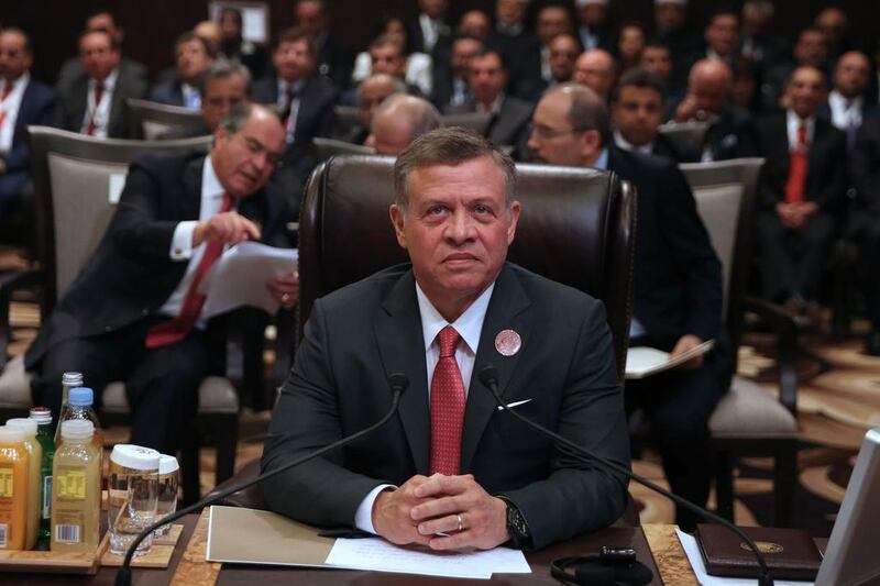 Jordan's King Abdullah II is hosting 21 other Arab leaders at the Arab League summit in the Jordanian Dead Sea resort of Sweimeh. Khalil Mazraawi / AFP