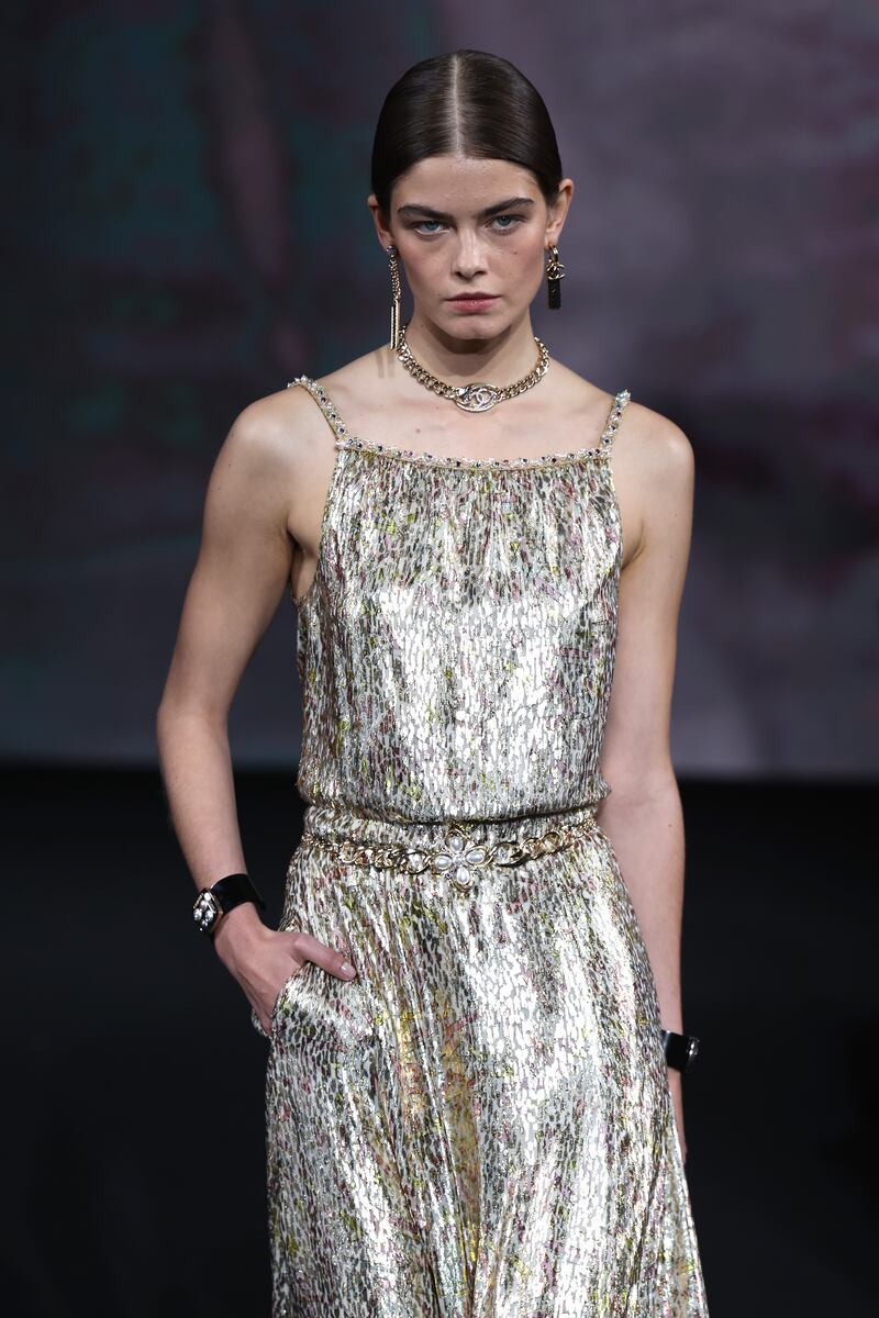 A lightweight metallic tunic dress at Chanel. Getty Images
