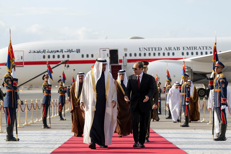 President Sheikh Mohamed speaks with Mr El Sisi upon his arrival in Cairo. All photos: UAE Presidential Court 