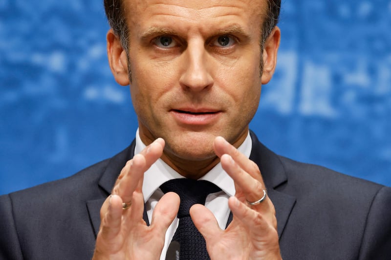 Emmanuel Macron holds a press conference at Elmau Castle. AFP