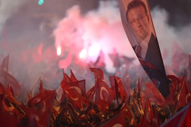 Supporters of Istanbul Mayor Ekrem Imamoglu, mayoral candidate of the main opposition Republican People's Party (CHP), celebrate following the early results in front of the Istanbul Metropolitan Municipality (IBB) in Istanbul, Turkey March 31, 2024.  REUTERS / Umit Bektas     TPX IMAGES OF THE DAY