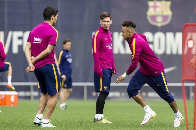 FC Barcelona’s players (L to R) Uruguayan Luis Suarez, Argentine Leo Messi and Brazilian Neymar attend a training session at the team’s Joan Gamper sports complex in the outside of Barcelona, northeastern Spain, 13 may 2016. FC Barcelona will face Granada CF in the last match of Spain’s La Liga season on 14 May. EPA/Quique Garcia