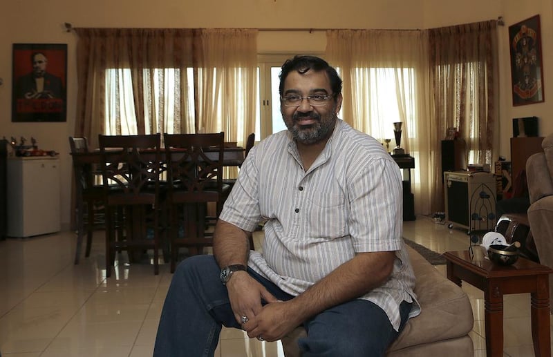 Vin Nair, 43, from India, was Dh1 million in debt in 2010 after a business venture failed, but he is now working hard to repay his liabilities. Jeffrey E Biteng / The National 