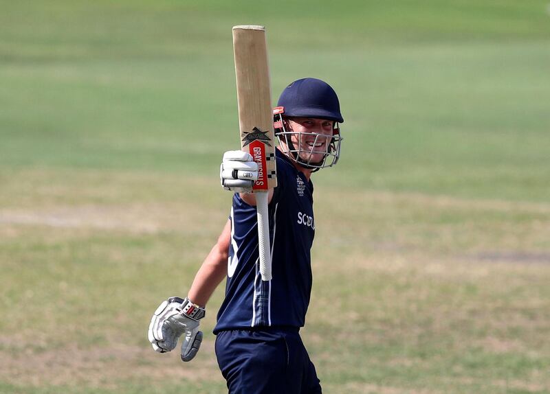 Dubai, United Arab Emirates - October 30, 2019: George Munsey of Scotland makes 50 during the game between the UAE and Scotland in the World Cup Qualifier in the Dubai International Cricket Stadium. Wednesday the 30th of October 2019. Sports City, Dubai. Chris Whiteoak / The National