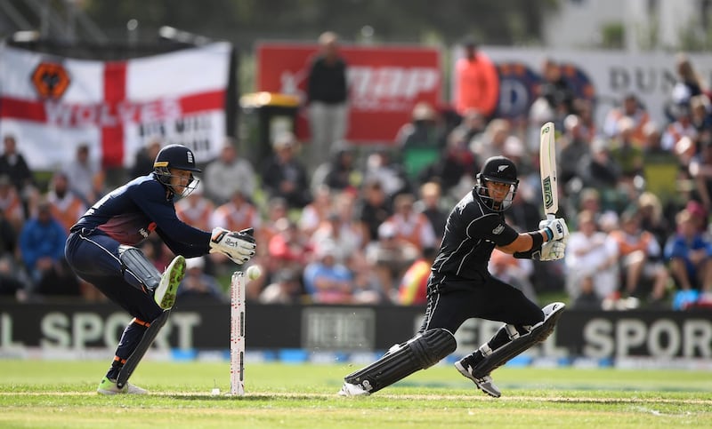 DUNEDIN, NEW ZEALAND - MARCH 07:  New Zealand batsman Ross Taylor hits out watched by Jos Buttler during the 4th ODI between New Zealand and England at University of Otago Oval on March 7, 2018 in Dunedin, New Zealand.  (Photo by Stu Forster/Getty Images)