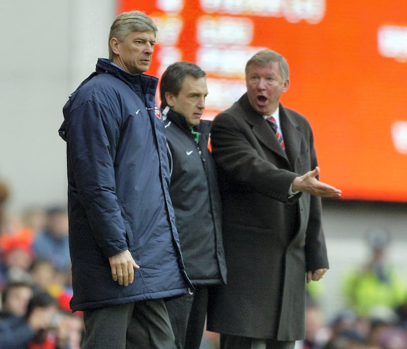 LONDON - MARCH 28:  Manager Arsene Wenger of Arsenal argues with manager Sir Alex Ferguson of Manchester United during the FA Barclaycard Premiership match between Arsenal and Manchester United at Highbury on March 28, 2004 in London.  (Photo by Clive Mason/Getty Images)