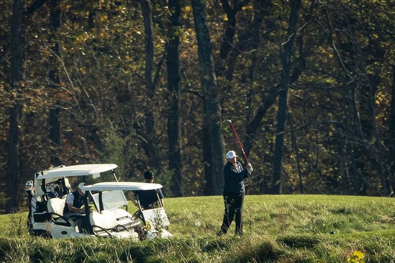 President Donald Trump plays golf at Trump National Golf Club in Sterling, Virginia. AFP