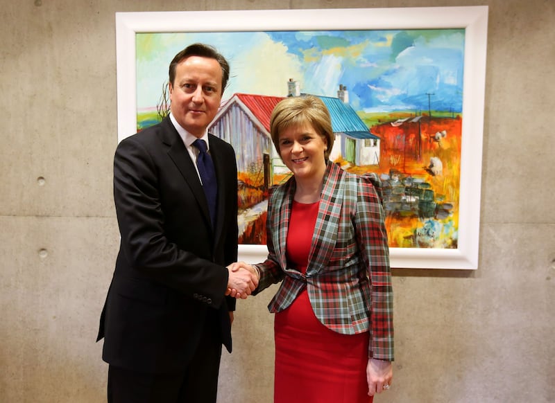 With former British prime minister David Cameron at the Scottish Parliament in January 2015. PA