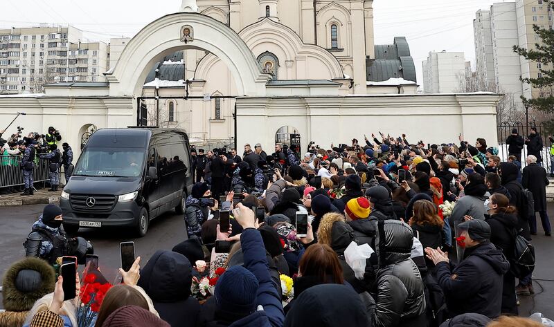A hearse outside the church. The Russian authorities denied involvement in Mr Navalny's death. Reuters