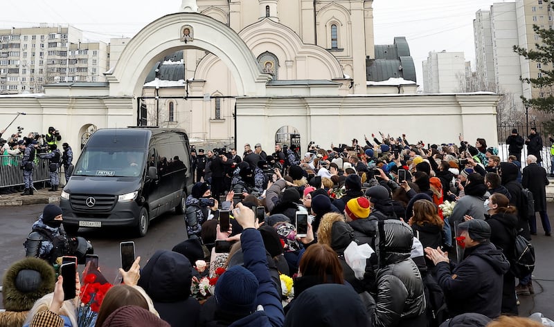 A hearse outside the church. The Russian authorities denied involvement in Mr Navalny's death. Reuters