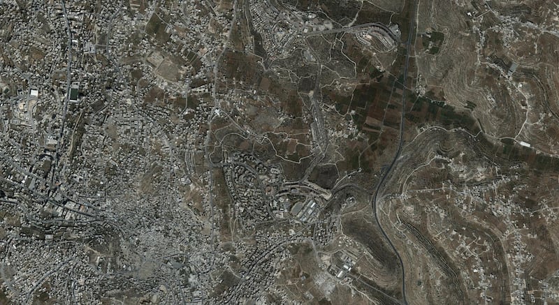 A handout photo made available by the Peace Now organization showing an aerial view of the Israeli settlement of Kiryat Arba in the West Bank.  EPA