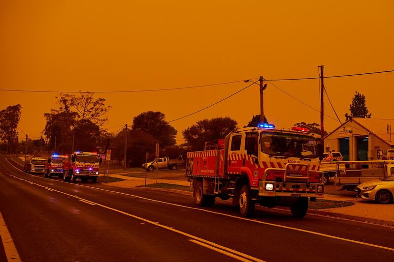 RFS Trucks gather in front of a station in Bodalla, New South Wales, Australia. Getty