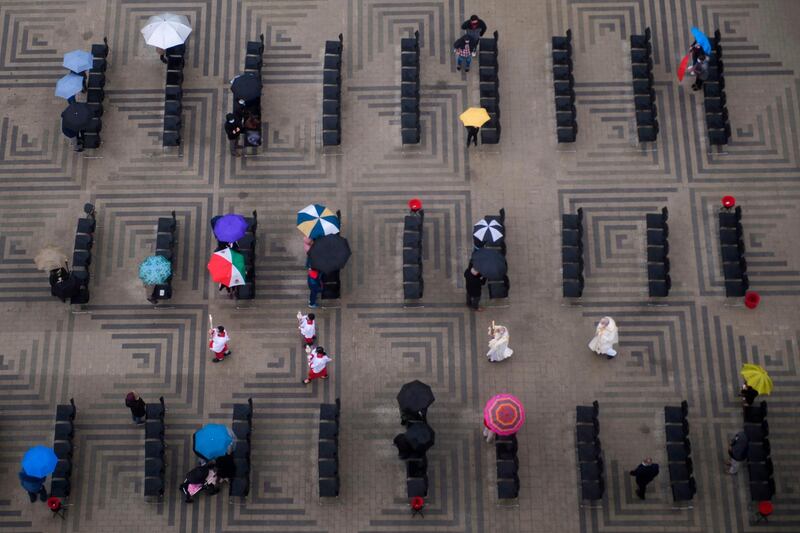 A view from above shows Deacon Rey Marin, centre right, and Father Christopher Smith arrive in a procession during a Christmas Eve Roman Catholic Mass at Christ Cathedral in Garden Grove, California. AFP