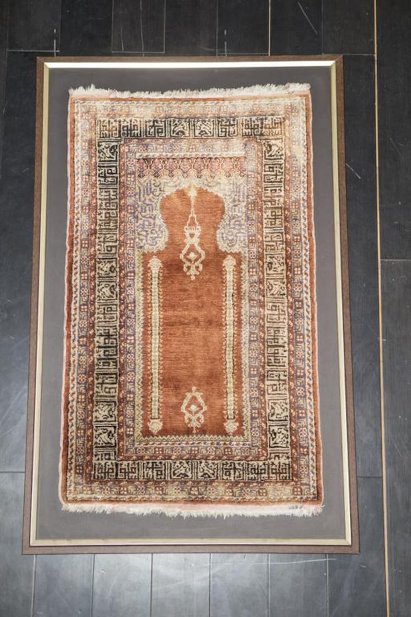 Ottoman Era prayer rug, 90-110 years old with Islamic inscriptions, made of Kurk wool. Antonie Robertson / The National