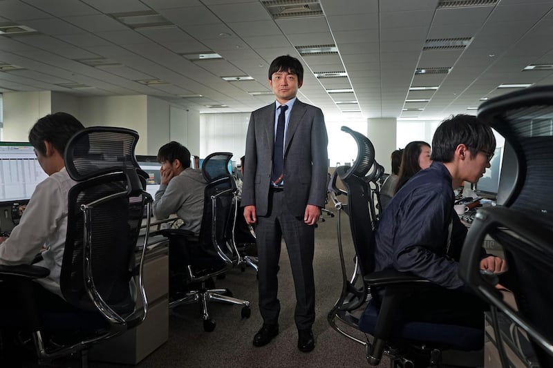 Yuzo Kano, chief executive officer of bitFlyer Inc., poses for a photograph in Tokyo, Japan, on Thursday, April 12, 2018. Kano, the Goldman Sachs Group Inc. alumnus, who turned bitFlyer into Japan's largest Bitcoin exchange, is scooping up traders and bankers from both his old employer and former rivals as he embarks on an ambitious international expansion. Photographer: Kentaro Takahashi/Bloomberg
