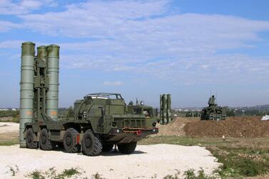 This handout picture obtained from the Russian Defence Ministry's official Facebook page on November 26, 2015 shows Russia's S-400 air defence missile systems at the Hmeimim airbase in the Syrian province of Latakia. Russia has deployed its advanced S-400 air defence system in Syria, the Russian defence ministry said on November 26, with the weapons to be used to cover the area around its airbase in coastal Latakia. AFP PHOTO / RUSSIAN DEFENCE MINISTRY RESTRICTED TO EDITORIAL USE - MANDATORY CREDIT " AFP PHOTO / RUSSIAN DEFENCE MINISTRY" - NO MARKETING NO ADVERTISING CAMPAIGNS - DISTRIBUTED AS A SERVICE TO CLIENTS (Photo by - / RUSSIAN DEFENCE MINISTRY / AFP)