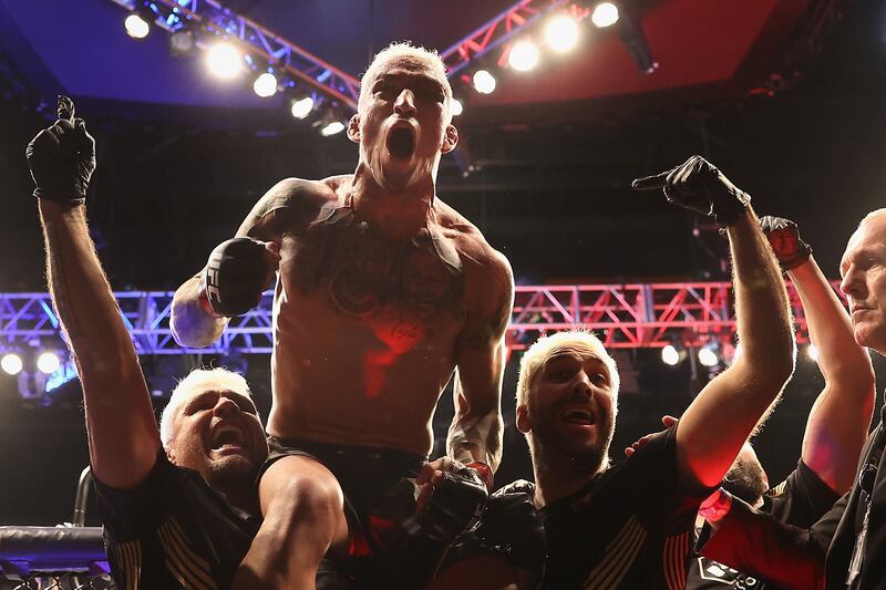 Charles Oliveira celebrates after his submission victory over Justin Gaethje in their lightweight championship bout at UFC 274 at Footprint Center on May 07, 2022 in Phoenix, Arizona. Getty
