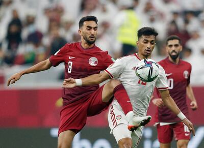 Abdullah Ramadan, right, in action for the UAE against Qatar in the Arab Cup. Reuters