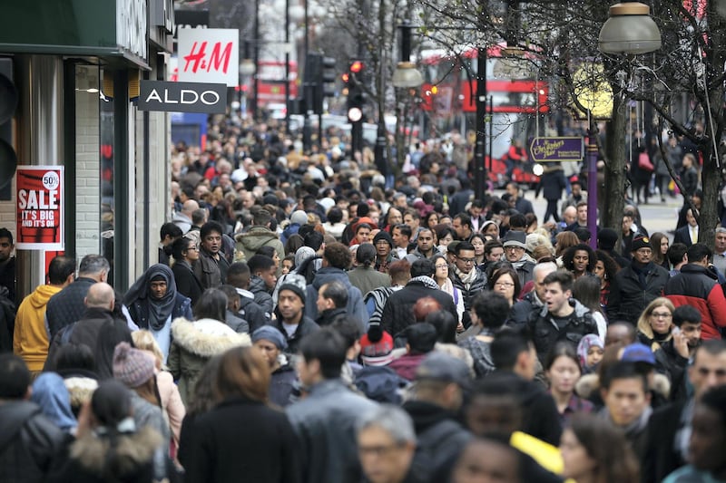 LONDON, ENGLAND - DECEMBER 26:  Shoppers on Oxford Street walk during the Boxing Day sales on December 26, 2015 in London, England. Boxing Day is one of the busiest days for retail outlets with thousands taking advantage of the post-Christmas sale prices.  (Photo by Dan Kitwood/Getty Images)