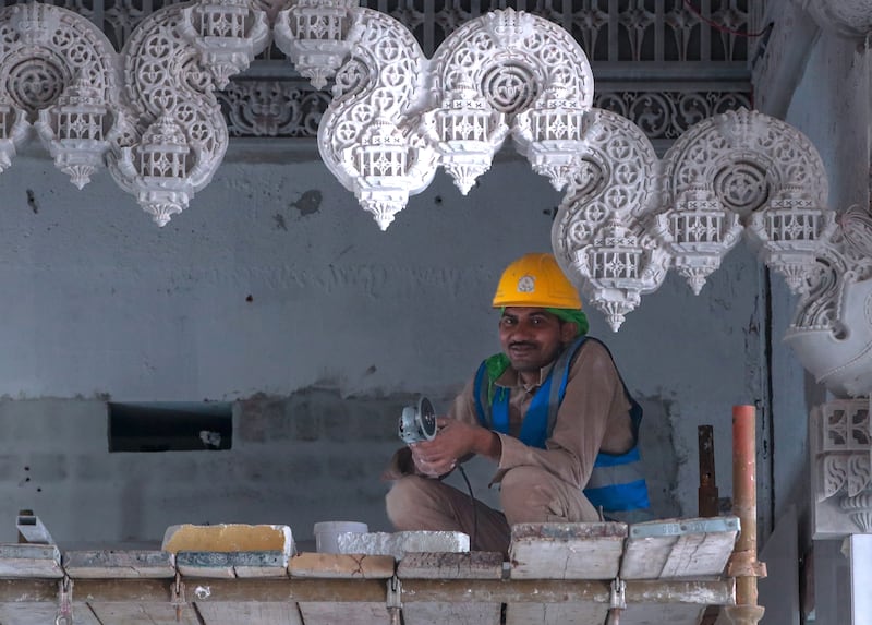 More than 2,000 artisans from India have carved 402 white marble pillars. Victor Besa / The National