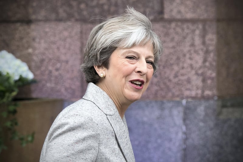 MANCHESTER, ENGLAND - OCTOBER 01:  Britain's Prime Minister, Theresa May, leaves her hotel to attend a television interview on the first day of the annual Conservative Party conference on October 1, 2017 in Manchester, England. Mrs May appeared on the show ahead of the official opening of the 2017 Conservative Party conference.  (Photo by Carl Court/Getty Images)