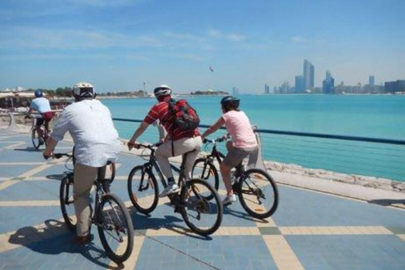 Cycling on the Corniche in Abu Dhabi.