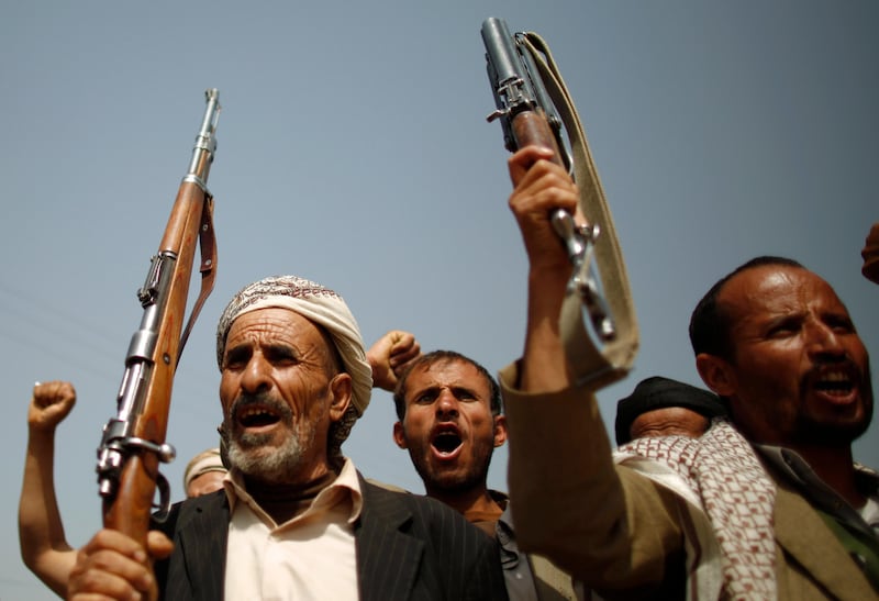 Tribesmen loyal to the al-Houthi Shi'ite rebel group shout slogans as they arrive to a gathering to denounce what say to be U.S. interference in Yemen, in the northwestern province of Saada, on the border with Saudi Arabia July 11, 2012. The mountainous province of Saada is the stronghold of Shi'ite rebels, known as the Houthis, after the clan of their leaders, who had fought government forces for years until an uprising against former President Ali Abdullah Saleh last year gave them a free hand in the lawless frontier province. Trying to counter the threat of al Qaeda, Washington is deepening its involvement in Yemen, using drone strikes to target suspected militants and training the Yemeni army to fight them. REUTERS/Khaled Abdullah (YEMEN - Tags: POLITICS CIVIL UNREST) - RTR34U18