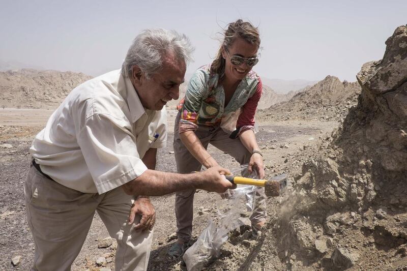 Ruth Impey, a UAE potter, and Mustafa Otaki, a retired professor of geochemistry, collect the clay from Wadi Haqeel which was used to produce Julfar ware. Antonie Robertson / The National