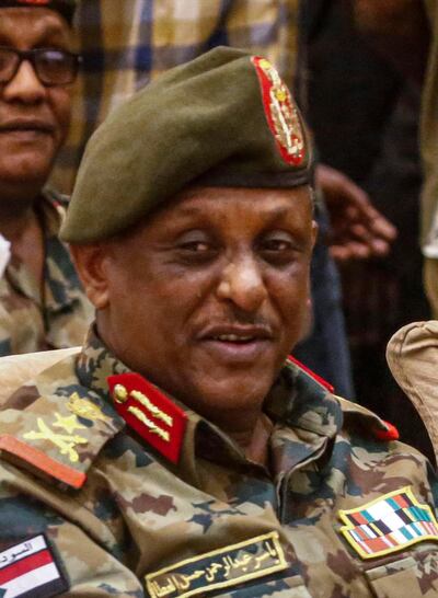 Sudanese army commander and member of the Transitional Military Council (TMC) Lieutenant General Yasser Abdelrahman Hassan al-Atta attends a ceremony for the signing of the constitutional declaration, attended by African Union and Ethiopian mediators in the capital Khartoum on August 4, 2019. - Sudan's army rulers and protest leaders on August 4 inked a hard-won constitutional declaration, paving the way for a promised transition to civilian rule. The agreement, signed during a ceremony witnessed by AFP,  builds on a landmark power-sharing deal signed on July 17 and provides for a joint civilian-military ruling body to oversee the formation of a transitional civilian government and parliament to govern for a three-year transition period. (Photo by ASHRAF SHAZLY / AFP)