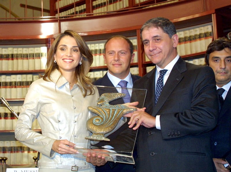 395805 01: Jordan's Queen Rania Al-Abdullah (L) is awarded the "Life Award" in recognition of her international patronage of the International Osteoporosis Foundation (IOF) and for her voluntary work for the international cause of osteoporosis October 12, 2001 in Rome, Italy. (Photo by Getty Images)