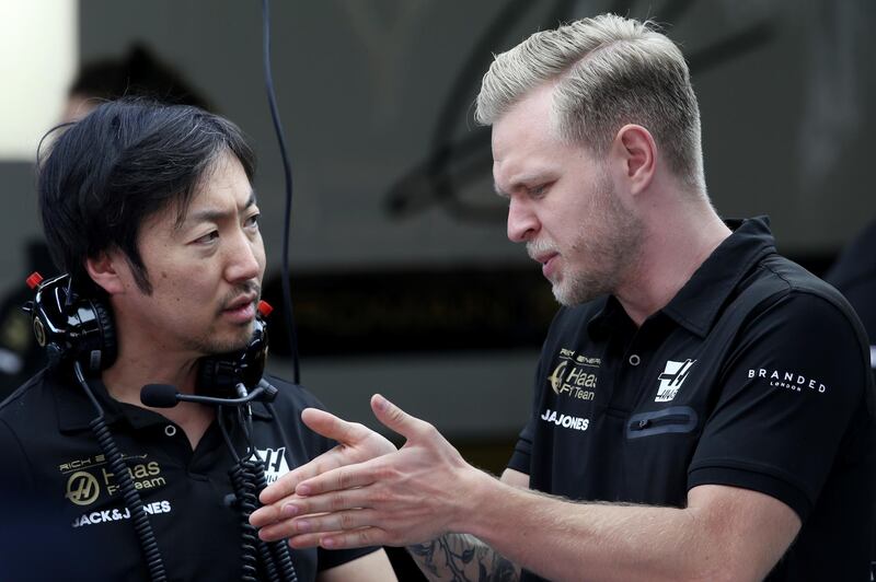 MONTMELO, SPAIN - FEBRUARY 27: Kevin Magnussen of Denmark and Haas F1 talks with race engineer Ayao Komatsu in the Paddock during day two of F1 Winter Testing at Circuit de Catalunya on February 27, 2019 in Montmelo, Spain. (Photo by Charles Coates/Getty Images)