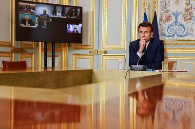 France's President Emmanuel Macron takes part in a videoconference with fellow world leaders on Tuesday. EPA