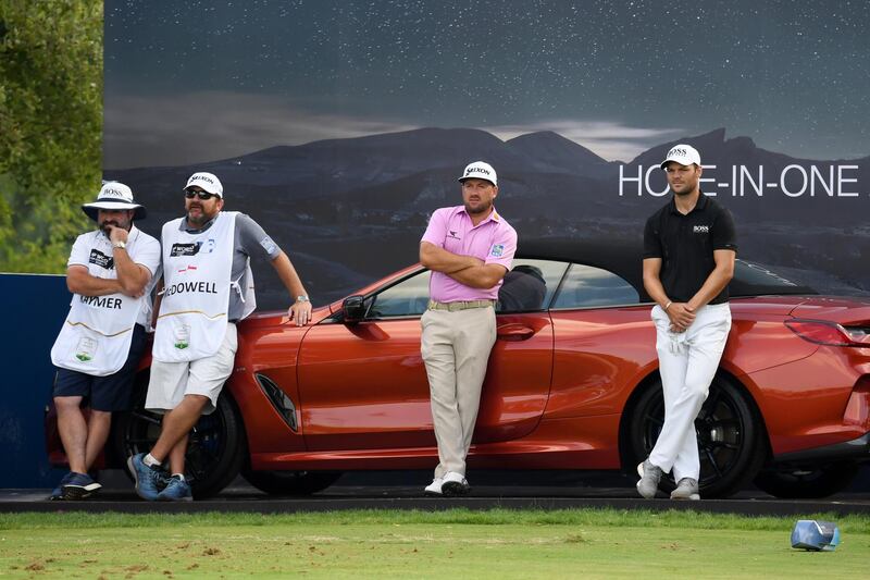 Ken Comboy, caddy of Graeme McDowell, Scot Craig Connelly, caddy of Martin Kaymer, Graeme McDowell of Northern Ireland and Martin Kaymer at the 17th tee. Getty