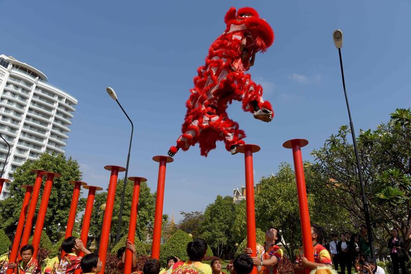Members of a lion dance troupe perform in Phnom Penh, Cambodia. AFP