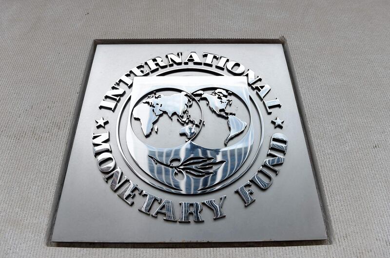 (FILES) In this file photo taken on March 27, 2020 An exterior view of the building of the International Monetary Fund (IMF), with the IMG logo, is seen  in Washington, DC.  The coronavirus pandemic could set African incomes back a decade as weak oil prices, curbed tourism and business lockdowns contract the continent's economy 3.2 percent in 2020, an IMF official said on June 29, 2020.
 / AFP / Olivier DOULIERY
