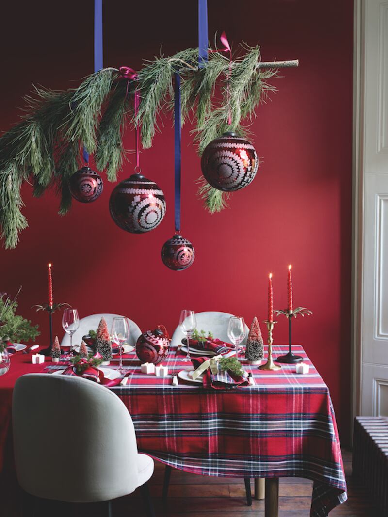 Candles add an instant festive feel to the Christmas table and beyond. Photo: Marks & Spencer