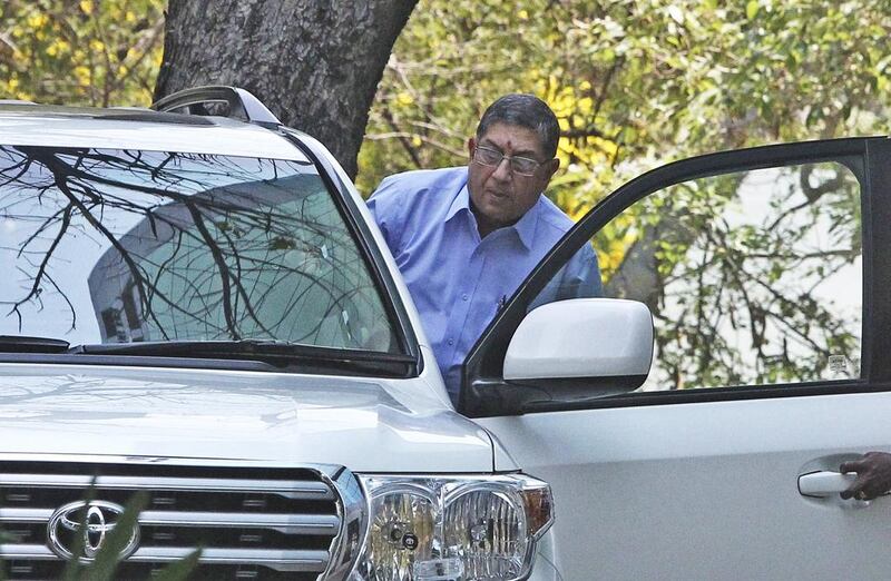Indian cricket board chief Narayanaswami Srinivasan gets into his car at the premises of the corporate office of India Cements, a company headed by him in Chennai, India, on March 25, 2014. The Supreme Court of India has told Srinivasan to step down from his post or be forced to leave to ensure a fair investigation into charges of match-fixing in the Indian Premier League. Arun Sankar K / AP Photo