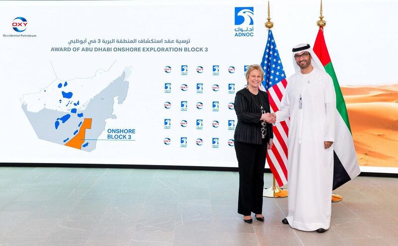 Dr Sultan Al Jaber, ADNOC Group CEO, and Vicki Hollub, CEO of Occidental shake hands after signing documents. Courtsey: Adnoc

