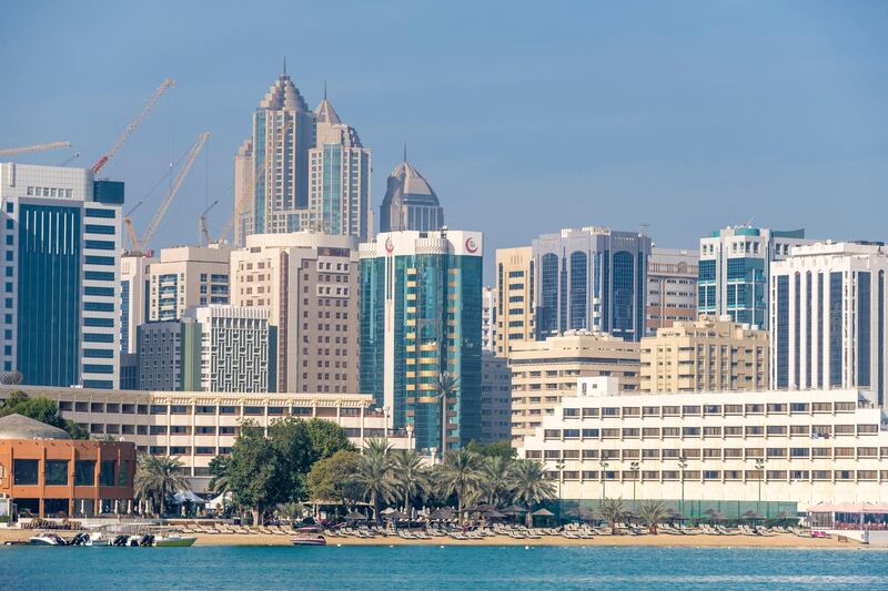 R7P182 United Arab Emirates, Abu Dhabi, Al Zahiyah district seen from Al Maryah Island promenade, beach of Meridien Abu Dhabi hotel. Alamy
