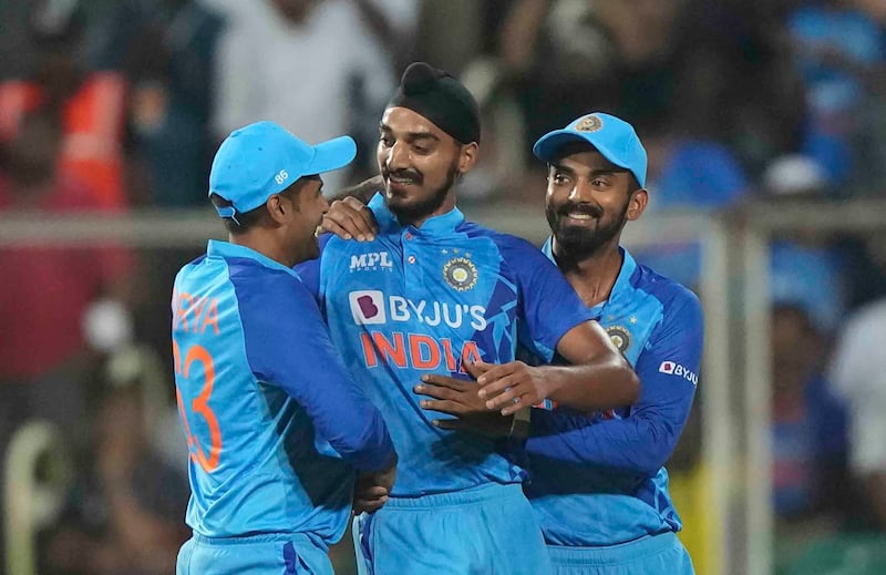 India's Arshdeep Singh, center, celebrates the dismissal of South Africa's David Miller during the first Twenty20 cricket match between India and South Africa in Thiruvananthapuram, India, Wednesday, Sept.  28, 2022.  (AP Photo/Mahesh Kumar A. )