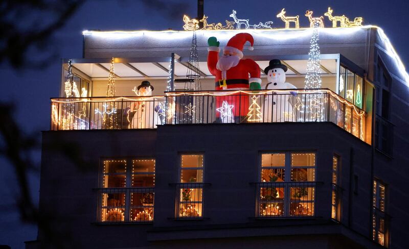 Christmas decorations are displayed on a rooftop terrace in the Wilmersdorf district of Berlin, Germany. Reuters