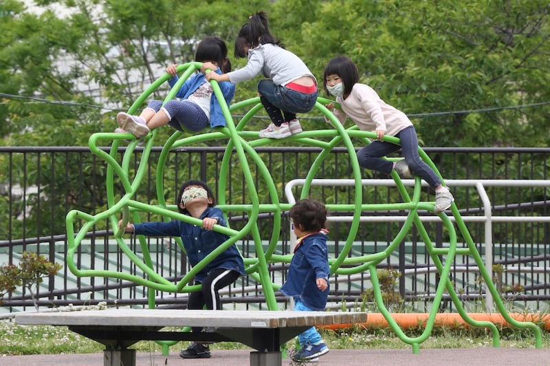 Children play at a park in Yokohama, Kanagawa prefecture, near Tokyo. AP Photo